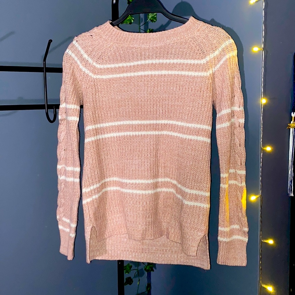 Dusty rose pink sweater with white stripes. Braided sleeve detail